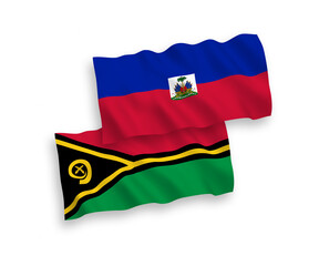 Fototapeta premium National vector fabric wave flags of Republic of Haiti and Republic of Vanuatu isolated on white background. 1 to 2 proportion.