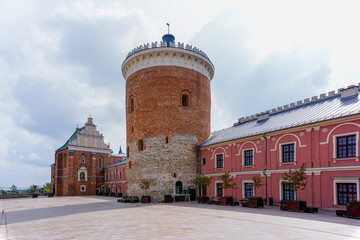 courtyard with guard tower and administrative buildings inside the Lublin Castle in the historic city center - obrazy, fototapety, plakaty