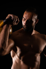 Fototapeta na wymiar Trainign while looking at his muscles