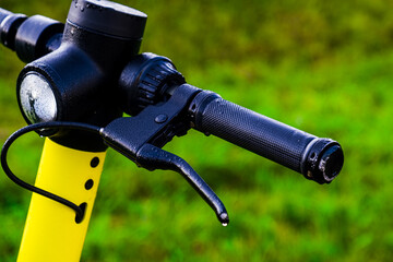 Electric scooter with drops of dew.