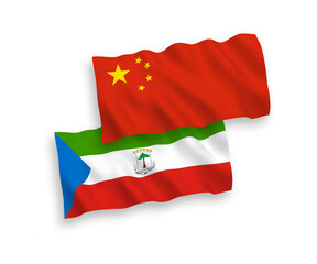 National vector fabric wave flags of Republic of Equatorial Guinea and China isolated on white background 1 to 2 proportion.