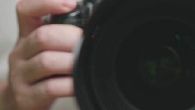 Close Up Hands Holding And Focus Lens Camera For Talk Photo Or Record Video
