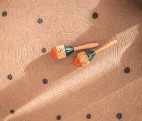 Top view of traditional Latin American musical instrument maracas (rumba shakers or tamaracas) in...