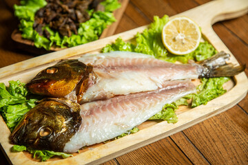 hot meat snacks for beer served on wooden dish