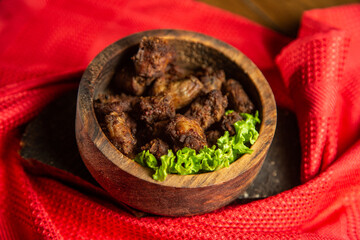 hot meat snacks for beer served on wooden dish