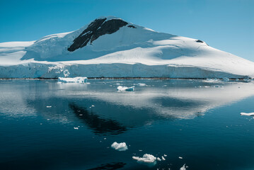 Lemaire strait coast, mountains and icebergs, Antartica