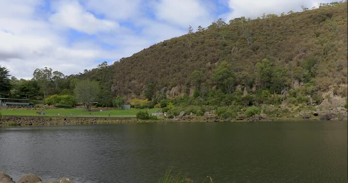 Left to right pan motion of Cataract River Gorge, it has a swimming pool, walking tracks and a charlift which is the longest single-span charlift in the world of 308 meters long, Launceston, Tasmania,