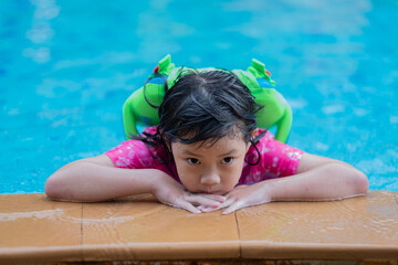 kid swimming at the pool, happy time