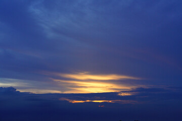 Fototapeta premium Sunset sky with dramatic clouds and beautiful dark blue cloud