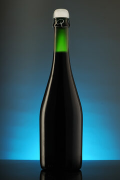glass full bottle of champagne