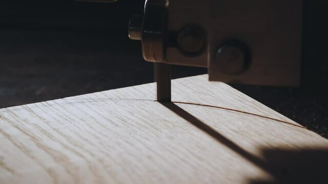 Close-up of wood carving on a machine in a carpentry workshop