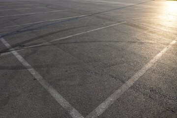 Aerial top view abstract texture and background of car tire drift skid mark on road race track, Black tire mark on street race track, Automobile and automotive concept.