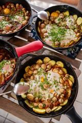 Cypriot skillet baked eggs, Cyprus dish with zucchini mushrooms and eggs