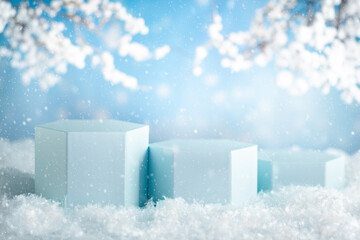 Winter composition with light blue podiums for product presentation in snowy background. Christmas,...