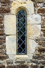 Fototapeta na wymiar Historic leaded light window in a church 