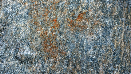 The picture is taken from a hard rock texture commonly found in mountainous areas and rivers, it can be used as material for the construction of houses, buildings and many other functions.