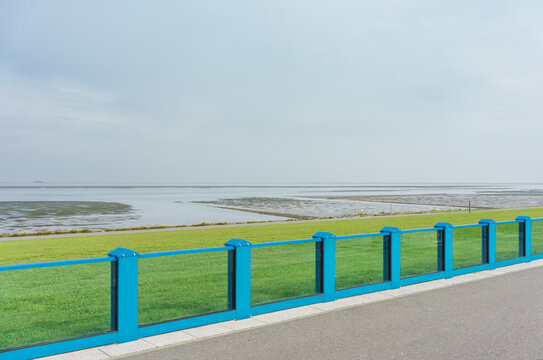 View from the top of the dike to the Wadden Sea of the North Sea 