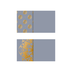 Business card in gray with abstract gold ornament for your business.