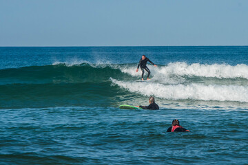 senior surfer in action in the waves
