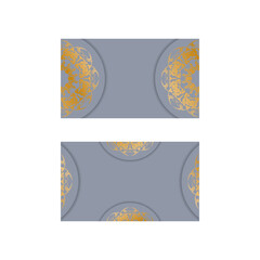 Business card in gray with a mandala gold pattern for your personality.