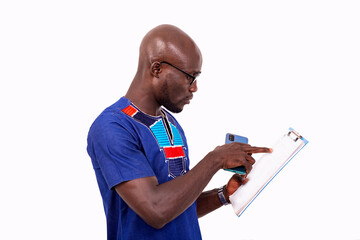 young serious businessman pointing finger at clipboard with document.