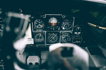 Vintage airplane dashboard contain the standard indicator for control the airplane inflight
