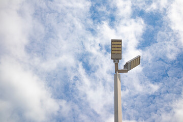 The solar cell device is mounted on the pole and the light is connected to the solar cell.