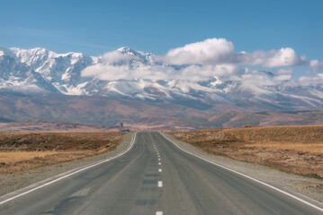 road mountains asphalt snow autumn clouds