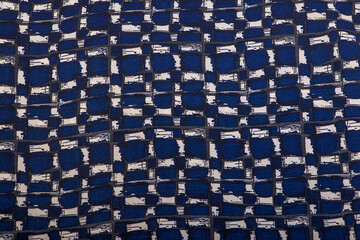 Texture background pattern. Silk fabric with a pattern of blue ,white and black squares ,100%...