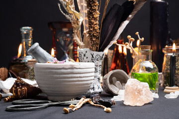Mortar and pestle witchcraft alchemy still life selective focus, witch craft pharmacy and medicine. Spiritual occultism chemistry, magic alchemy and ritual arrangement. - obrazy, fototapety, plakaty