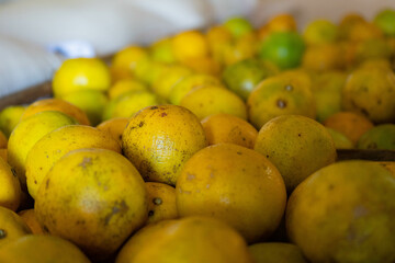 Close-up of oranges in wooden crate