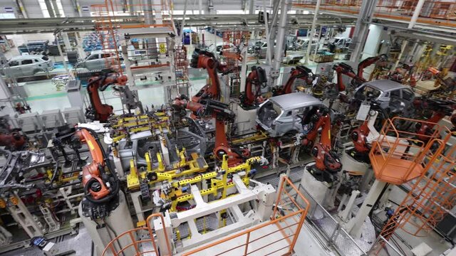 robotic welding in a modern passenger car factory