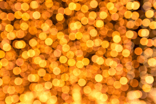 abstract blur yellow-gold color for background, blurred and defocused effect for design, lighting blurred yellow-gold background using as the background, wallpaper concept.