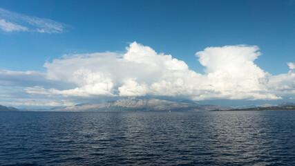 sea, boat, water, sailing, ocean, sky, sail, yacht, ship, nature, sailboat, travel, summer, cloud, clouds, landscape, coast, blue, holiday, waves, wind, horizon, mountain, mountains, seascape, tourism