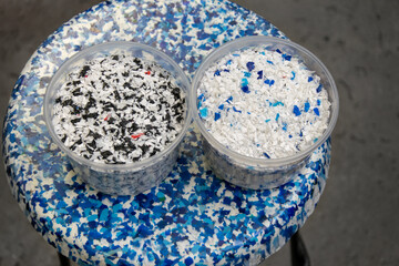 Recyclable plastic flakes. Recycling of plastics.