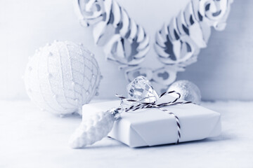 Christmas present on bright background. Close up. Copy space.	