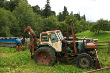 Old broken soviet tractor.
