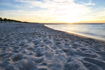 Naklejka premium sunset on the baltic sea over the beach