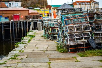 Crab pots, lobster pots, fish traps and gear on Tate Hill Pier in Whitby Harbour
