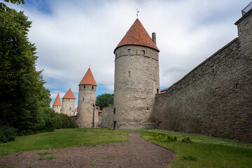 Fototapeta na wymiar Towers Square view of Tallinn medieval City Wall - Tallinn, Estonia