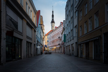 Fototapeta na wymiar Tallinn old town Viru Street with Tallinn Town Hall Tower on background - Tallinn, Estonia