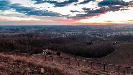 Colorful sunset in the italian vineyards