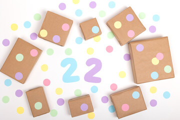 Christmas crafts paper holiday boxes on white background. Christmas winter holiday congratulation invitation birthday wedding. flat lay