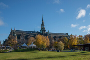 Old Gothic museum building with towers from 1873 colorful autumn day in Stockholm