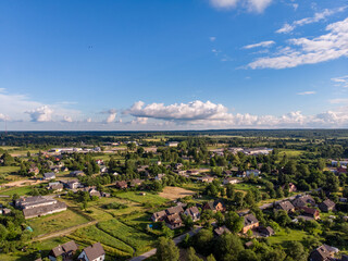 Areal drone phortography view of small city suburbs houses and streets.