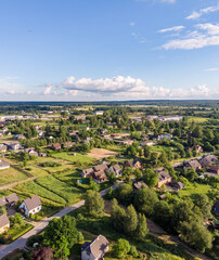 Areal drone phortography view of small city suburbs houses and streets.