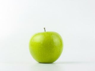 green apple on white