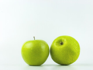 green apples on white background