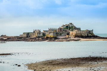 Elizabeth Castle in a low tide waters, Saint Helier, bailiwick of Jersey, Channel Islands