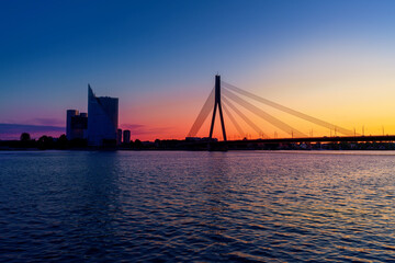 Obraz premium Vansu Bridge and Daugava River at sunset - Riga, Latvia